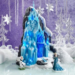 Department 56 12" Pre-Lit Blue And White Disney Frozen Elsa Ice Palace Christmas Tabletop Decor 5 Department 56 12" Pre-Lit Blue And White Disney Frozen Elsa Ice Palace Christmas Tabletop Decor -Christmas Decoration Store dept 56204048962 3 17244.1599268856