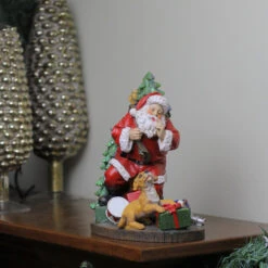Roman 8.75" Tiptoeing Santa With Smiling Dog Christmas Tabletop Figurine 5 Roman 8.75" Tiptoeing Santa With Smiling Dog Christmas Tabletop Figurine -Christmas Decoration Store roman20131654 3 42171.1587644956