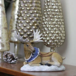 Roman 6.5” Brown And Blue Resting Moose With Blue Harness Christmas Tabletop Figurine -Christmas Decoration Store roman20633201 3 08639.1587644956